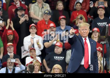 U.S. President Donald Trump greets supporters as he steps on the stage for a campaign rally with Vice-President Mike Pence at the Giant Center, in Hershey, PA, on December 10, 2019. (Photo by Bastiaan Slabbers/NurPhoto) Stock Photo