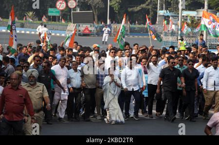 West Bengal Chief Minister & Trinamool Congress (TMC) Supremo Mamata Banerjee led a massive protest march along with party supporters to protest against the Indian government's Citizenship Amendment Act (CAA) in Kolkata , India on Monday , 16th December , 2019. Hundreds of her party leaders and supporters walked with her carrying posters and flags against the controversial law in the first of several protests over the next three days. (Photo by Sonali Pal Chaudhury/NurPhoto) Stock Photo