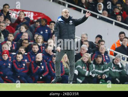 Manchester City manager Pep Guardiola during English Premier League between Arsenal and Manchester City at Emirates stadium , London, England on 15 December 2019. (Photo by Action Foto Sport/NurPhoto) Stock Photo