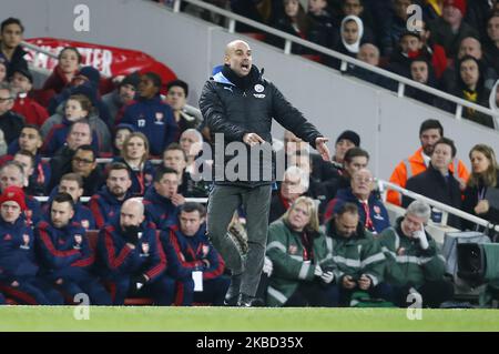Manchester City manager Pep Guardiola during English Premier League between Arsenal and Manchester City at Emirates stadium , London, England on 15 December 2019. (Photo by Action Foto Sport/NurPhoto) Stock Photo