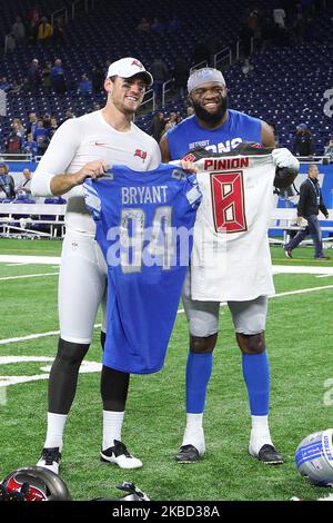 Tampa Bay Buccaneers punter Bradley Pinion (8) and Detroit Lions defensive end Austin Bryant (94) swap jerseys after the conclusion of an NFL football game between the Detroit Lions and the Tampa Bay Buccaneers in Detroit, Michigan USA, on Sunday, December 15, 2019. (Photo by Amy Lemus/NurPhoto) Stock Photo
