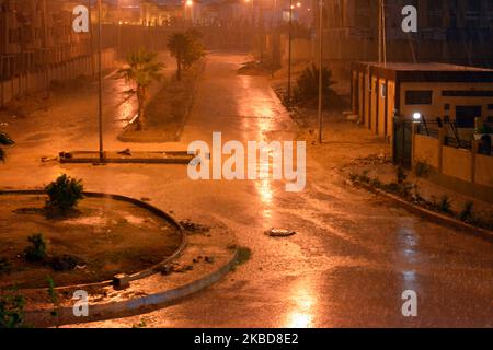 Cairo, Egypt, October 25 2022: foggy unclear scene of the streets due to heavy rains flooding with stormy wind, thunder and lightning in Cairo, Egypt, Stock Photo