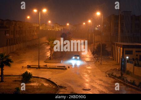 Cairo, Egypt, October 25 2022: foggy unclear scene of the streets due to heavy rains flooding with stormy wind, thunder and lightning in Cairo, Egypt, Stock Photo