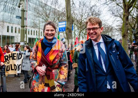 After the positive resolution in the Urgenda case, Marjan Minnesma, the director of the Urgenda campaign and Dennis van Berkel climate jurist, congratulated to the activists demonstrating outside in support of the Urgenda case, that took place in front of the Supreme Court in The Hague, on December 20th, 2019. (Photo by Romy Arroyo Fernandez/NurPhoto) Stock Photo