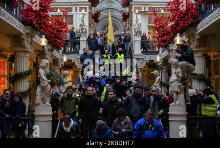 The yellow vests demonstrated Passage Pommeraye in Nantes, France for act 59 of their movement in support of the strikers mobilized against the pension reform on December 28, 2019 (Photo by Estelle Ruiz/NurPhoto) Stock Photo