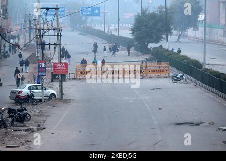 A view of the road which has been blocked by protesters who are on an indefinite sit-in against the Citizenship Amendment Act (CAA) and National Register of Citizens (NRC) at Shaheen Bagh, Okhla on December 28, 2019 in New Delhi, India. The Citizenship Amendment Act has triggered nationwide protests as it paved way for six minority communities Hindus, Sikhs, Jain, Buddhists, Zoroastrians and Christians who came to India from Pakistan, Bangladesh or Afghanistan to escape religious persecution before December 31, 2014 to get Indian citizenship. So far, 25 people have died and thousands arrested  Stock Photo