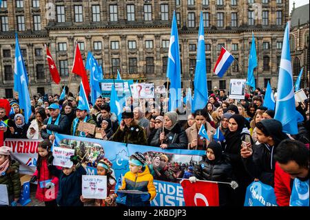 Hundreds of people are holding flags and placards during the demonstration in solidarity with the Uyghurs, started in Amsterdam, on December 29th, 2019. (Photo by Romy Arroyo Fernandez/NurPhoto) Stock Photo