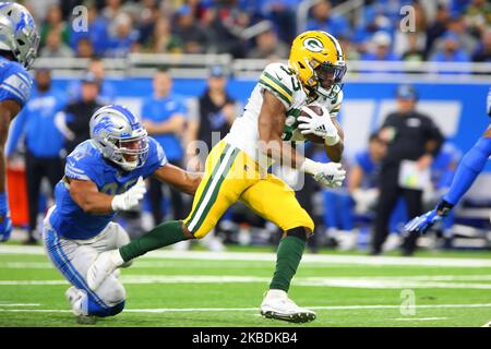 Green Bay Packers running back Aaron Jones (33) runs for yardage during the second half of an NFL football game against the Detroit Lions in Detroit, Michigan USA, on Sunday, December 29, 2019. (Photo by Amy Lemus/NurPhoto) Stock Photo