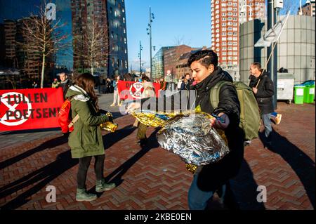 An activist is running for her life during a Die-in action carried by XR group in The Netherlands that took place in the center of Rotterdam, on January 6th, 2020. (Photo by Romy Arroyo Fernandez/NurPhoto) Stock Photo