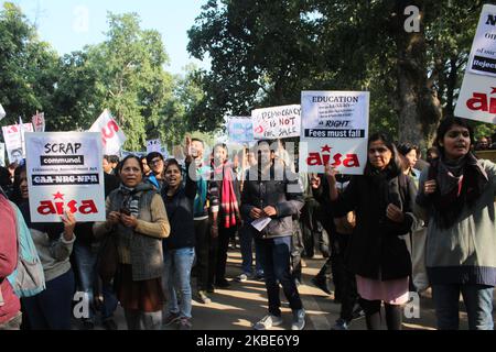 Hundreds of people, including students and teachers, protesting against Sunday's mob violence on JNU campus, marched from Mandi House to HRD Ministry, demanding the removal of their vice-chancellor on January 9, 2020 in New Delhi, India. After Jawaharlal Nehru University Students' Union (JNUSU) president Aishe Ghosh gave a call to protesters to head towards the Rashtrapati Bhawan, a scuffle broke out with the Delhi Police as they stopped the march near Shastri Bhawan. The police then lathi charged and detained students. (Photo by Mayank Makhija/NurPhoto) Stock Photo