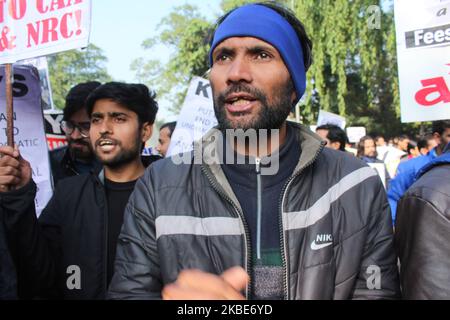 Hundreds of people, including students and teachers, protesting against Sunday's mob violence on JNU campus, marched from Mandi House to HRD Ministry, demanding the removal of their vice-chancellor on January 9, 2020 in New Delhi, India. After Jawaharlal Nehru University Students' Union (JNUSU) president Aishe Ghosh gave a call to protesters to head towards the Rashtrapati Bhawan, a scuffle broke out with the Delhi Police as they stopped the march near Shastri Bhawan. The police then lathi charged and detained students. (Photo by Mayank Makhija/NurPhoto) Stock Photo