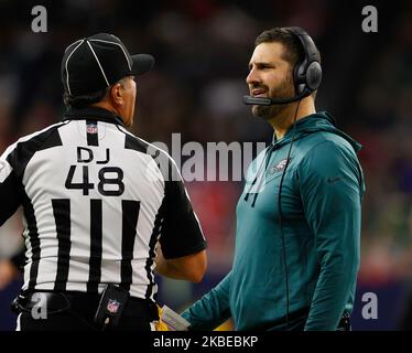 November 3, 2022: Houston Texans head coach Lovie Smith talks with  Philadelphia Eagles cornerback Darius Slay (2) as officials review a Texans  catch challenged by the Eagles during an NFL game on