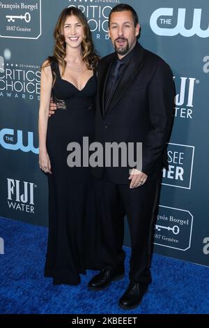 SANTA MONICA, LOS ANGELES, CALIFORNIA, USA - JANUARY 12: Jackie Sandler and Adam Sandler arrive at the 25th Annual Critics' Choice Awards held at the Barker Hangar on January 12, 2020 in Santa Monica, Los Angeles, California, United States. (Photo by Xavier Collin/Image Press Agency/NurPhoto) Stock Photo