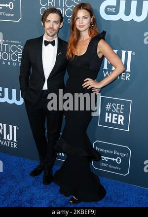 SANTA MONICA, LOS ANGELES, CALIFORNIA, USA - JANUARY 12: Tom Payne and Jennifer Akerman arrive at the 25th Annual Critics' Choice Awards held at the Barker Hangar on January 12, 2020 in Santa Monica, Los Angeles, California, United States. (Photo by Xavier Collin/Image Press Agency/NurPhoto) Stock Photo