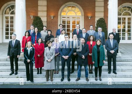 (L-R front row) Spain's Deputy Prime Minister of Economic Affairs Nadia Calvino, Spain's first Deputy Prime Minister and Minister of Presidency and Relations with Parliament Carmen Calvo, Spanish Prime Minister Pedro Sanchez, Spain's Deputy Prime Minister for Social Rights and Spain's 2030 Agenda Pablo Iglesias, Spain's Deputy Prime Minister of Ecological Transition and Demographic Challenge Teresa Ribera, (L-R second row) Spain's Minister of Interior Fernando Grande-Marlaska, Spain's Minister of Defence Margarita Robles, Spain's Minister of Foreign Affairs Arancha Gonzalez Laya, Spain's Minis Stock Photo