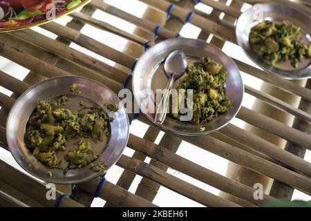 Traditional Assamese dish made from potatoes chillies and coriander pictured on the floor in the kitchen of a bamboo house at Majuli island, Assam, India on 6 March, 2019. (Photo by Krystof Kriz/NurPhoto) Stock Photo