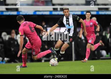Joelinton of Newcastle United in action with Eoghan O'Connell of Rochdale during the FA Cup match between Newcastle United and Rochdale at St. James's Park, Newcastle on Tuesday 14th January 2020. (Photo by Mark Fletcher/MI News/NurPhoto) Stock Photo