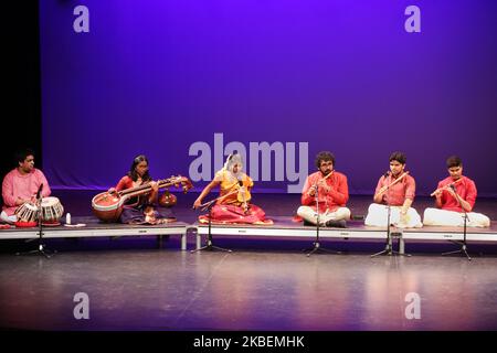 Tamil youth perform a classical song in the traditional Carnatic style of music during a cultural program celebrating the Thai Pongal Festival in Markham, Ontario, Canada, on January 12, 2020. The festival of Thai Pongal is a thanksgiving festival honoring the Sun God (Lord Surya) and celebrating a successful harvest. (Photo by Creative Touch Imaging Ltd./NurPhoto) Stock Photo