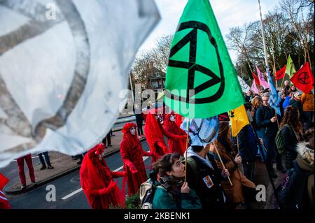 XR activists are holding banners and shouting slogans in front of the Australian embassy during the second Extinction Rebellion solidarity demonstration with Australia, in The Hague, on January 16th, 2020. (Photo by Romy Arroyo Fernandez/NurPhoto) Stock Photo