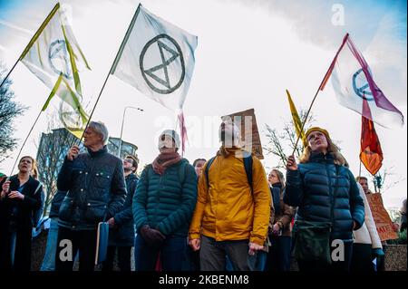 XR activists are holding banners and shouting slogans in front of the Australian embassy during the second Extinction Rebellion solidarity demonstration with Australia, in The Hague, on January 16th, 2020. (Photo by Romy Arroyo Fernandez/NurPhoto) Stock Photo