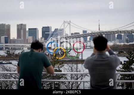 Giant Olympic Rings are installed at the waterfront area at Odaiba Marine Park in Minato Ward, Tokyo on January 17, 2020. Japan. The giant symbol is 32.6-meter-wide and 15.3-meter-long, the 2020 Summer Olympics is scheduled to take place from 24 July to 9 August 2020. (Photo by Alessandro Di Ciommo/NurPhoto) Stock Photo