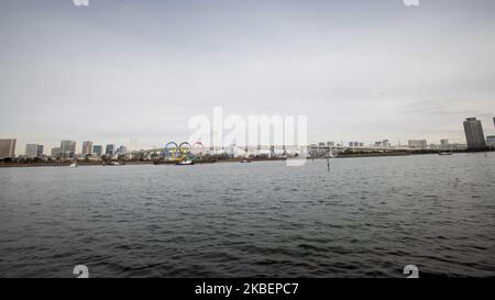 Giant Olympic Rings are installed at the waterfront area at Odaiba Marine Park in Minato Ward, Tokyo on January 17, 2020. Japan. The giant symbol is 32.6-meter-wide and 15.3-meter-long, the 2020 Summer Olympics is scheduled to take place from 24 July to 9 August 2020. (Photo by Alessandro Di Ciommo/NurPhoto) Stock Photo