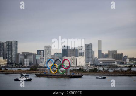 Giant Olympic Rings are installed at the waterfront area at Odaiba Marine Park in Minato Ward, Tokyo on January 17, 2020. Japan. The giant symbol is 32.6-meter-wide and 15.3-meter-long, the 2020 Summer Olympics is scheduled to take place from 24 July to 9 August 2020. (Photo by Alessandro Di Ciommo/NurPhoto) Stock Photo