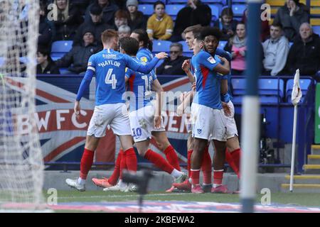 Christian Burgess of Portsmouth FC celebrates with his teammates after scoring his sides first goal of the game during the Sky Bet League 1 match between Bolton Wanderers and Portsmouth at the Reebok Stadium, Bolton on Saturday 18th January 2020. (Photo by Tim Markland/MI News/NurPhoto) Stock Photo