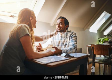 The face I always want to see smiling. a young couple spending time together at a cafe. Stock Photo
