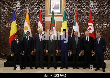 Minister of Foreign Affairs of Niger, Kalla Ankourao, Chadian Minister of Foreign Affairs Mahamat Zene Cherif, Egyptian Foreign Minister Sameh Shoukry, Algerian Foreign Minister Sabri Boukadoum, Minister of Foreign Affairs of Mali Tiebile Drama, Sabri Bache Tabdji State Secretary responsible for the management of the Tunisian Ministry of Foreign Affairs pose during a meeting of Libya's neighbouring countries in Algiers, Algeria, 23 January 2020. Officials from Algeria, Chad, Egypt, Mali, Niger, Sudan and Tunisia, as well as Germany, met as part of international efforts to reach a political set Stock Photo