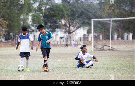 Training of FC Simla Youngs football club in Delhi, India on 2 April, 2018. The conditions in India for top football (soccer) are difficult. The heat - the season in lower competitions is only two months, ie in March and April. Poor surfaces and smog are also problematic. Simla Youngs is a club that was founded in 1936 and is one of the most traditional in India. Recently, clubs like Barcelona Gurgaon, Paris Saint Germain started to open their soccer academies, fees at such academies are not cheap. Trainers come from Europe for trainings, world champions David Trezeguet, Alessandro del Piero o Stock Photo