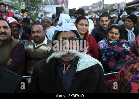 Supporters of Aam Aadmi Party cheer Delhi's Chief Minister Arvind Kejriwal during a public gathering while campaigning ahead of Delhi Assembly elections at Nangloi Jat on January 24, 2020 in New Delhi, India. (Photo by Mayank Makhija/NurPhoto) Stock Photo