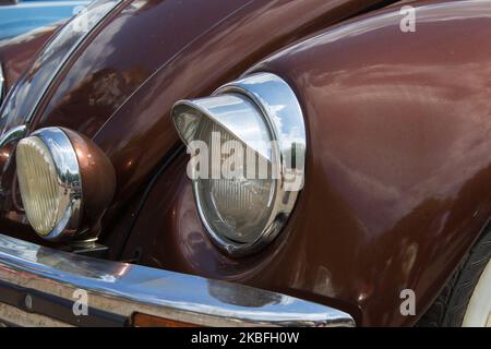 round headlight old car up close photos Stock Photo