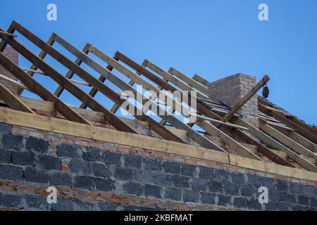 House under construction. Roofing tiles preparing to Install Stock Photo