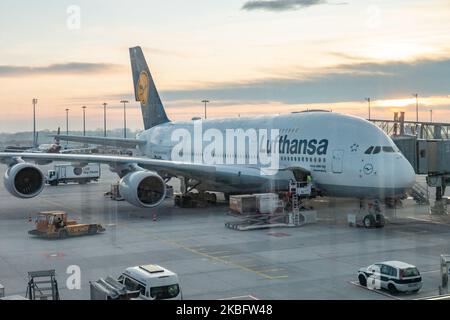 A double decker Airbus A380 aircraft with registration D-AIME and the name Johannesburg as seem docked at the terminal of Munich Airport read for long haul flight. Early morning airplane traffic movement of Lufthansa aircraft with their logo visible on the tarmac and docked via jetbridge or air bridge at the terminal at Munich MUC EDDM international airport in Bavaria, Germany, Flughafen München in German. Deutsche Lufthansa DLH LH is the flag carrier and largest airline in Germany using Munich as one of their two hubs. Lufthansa is a Star Alliance aviation alliance member. January 26, 2020 (P
