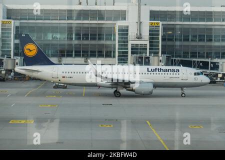 A Lufthansa Airbus A320 with registration D-AIWA and sharklets in front of the gate 219 and 220 at the terminal of Munich airport. Early morning airplane traffic movement of Lufthansa aircraft with their logo visible on the tarmac and docked via jetbridge or air bridge at the terminal at Munich MUC EDDM international airport in Bavaria, Germany, Flughafen München in German. Deutsche Lufthansa DLH LH is the flag carrier and largest airline in Germany using Munich as one of their two hubs. Lufthansa is a Star Alliance aviation alliance member. January 26, 2020 (Photo by Nicolas Economou/NurPhoto