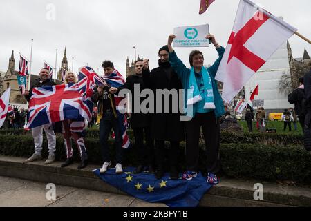 Pro-Brexit supporters trample over the EU flag in Parliament Square as they celebrate Brexit day on 31 January, 2020 in London, England. Today, Britain formally leaves the European Union at 11 pm after 47 years of membership, and enter an 11-month transition period during which the future trade deal will be negotiated. (Photo by WIktor Szymanowicz/NurPhoto) Stock Photo