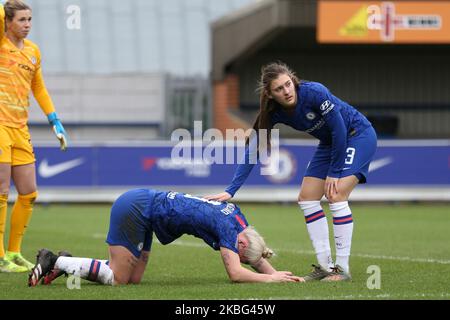 Hannah Blundell of Chelsea Women with an injured Bethany England of Chelsea Women during the Barclays FA Women's Super League match between Chelsea and West Ham United at the Kingsmeadow, Kingston on Thames on Sunday 2nd February 2020. (Photo by Jacques Feeney/MI News/NurPhoto) Stock Photo