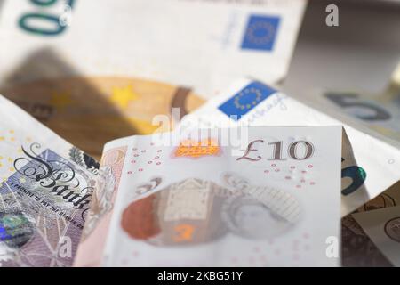 Currency, exchange rate, illustration photo mix of money, Sterling / British Pound GBP and Euro EUR banknotes paper bills and coin at close up pictures after the Brexit. Amsterdam, Netherlands - 02 02 2020 (Photo by Nicolas Economou/NurPhoto) Stock Photo