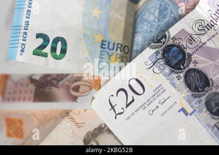 Currency, exchange rate, illustration photo mix of money, Sterling / British Pound GBP and Euro EUR banknotes paper bills and coin at close up pictures after the Brexit. Amsterdam, Netherlands - 02 02 2020 (Photo by Nicolas Economou/NurPhoto) Stock Photo