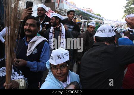 Supporters of Aam Aadmi Party cheer Delhi Chief Minister Arvind Kejriwal along with Deputy Chief Minister Manish Sisodia during a road show at Patparganj ahead of Delhi Assembly Elections on February 3, 2020 in New Delhi, India. The Delhi Assembly polls will be held on February 8 while the results will be announced on February 11. (Photo by Mayank Makhija/NurPhoto) Stock Photo