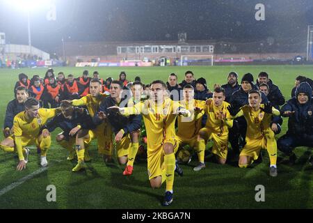 Adrian Petre and the players of Romania U21 celebrates with the fans after the game of UEFA U21 championship between Romania U21 v Finland U21, in Voluntari, Romania, on November 14, 2019. (Photo by Alex Nicodim/NurPhoto) Stock Photo