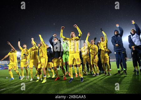 Adrian Petre and the players of Romania U21 celebrates with the fans after the game of UEFA U21 championship between Romania U21 v Finland U21, in Voluntari, Romania, on November 14, 2019. (Photo by Alex Nicodim/NurPhoto) Stock Photo