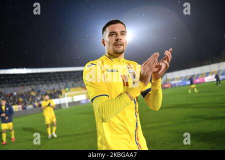 Adrian Petre of Romania U21 celebrates with the fans after the game of UEFA U21 championship between Romania U21 v Finland U21, in Voluntari, Romania, on November 14, 2019. (Photo by Alex Nicodim/NurPhoto) Stock Photo