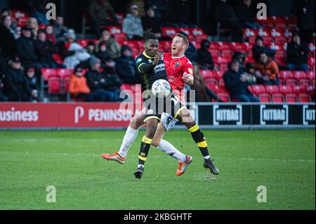 David Sesay of Crawley Town FC collides with Adam Rooney of Salford City FC during the Sky Bet League 2 match between Salford City and Crawley Town at Moor Lane, Salford on Saturday 8th February 2020. (Photo by Ian Charles/MI News/NurPhoto) Stock Photo