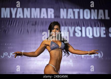 Female bodybuilding athlete competes in the Myanmar National Championship Bodybuilding and Physique Sports Competition in Yangon on February 9, 2020. (Photo by Shwe Paw Mya Tin/NurPhoto) Stock Photo