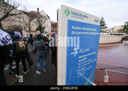 Protestors demonstrate for a greater inclusion of people with disabilies in front of the Departemental Center for Disabled Persons (Maison départementale des personnes handicapées MDPH) in Nanterre, in the inner suburbs of Paris, on February 11, 2020, the day when a National Conference on Disability (CNH) is held at the Élysée Palace,chaired by the French president Emmanuel Macron . (Photo by Michel Stoupak/NurPhoto) Stock Photo