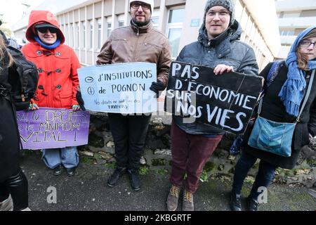 Protestors demonstrate for a greater inclusion of people with disabilies in front of the Departemental Center for Disabled Persons (Maison départementale des personnes handicapées MDPH) in Nanterre, in the inner suburbs of Paris, on February 11, 2020, the day when a National Conference on Disability (CNH) is held at the Élysée Palace,chaired by the French president Emmanuel Macron . (Photo by Michel Stoupak/NurPhoto) Stock Photo