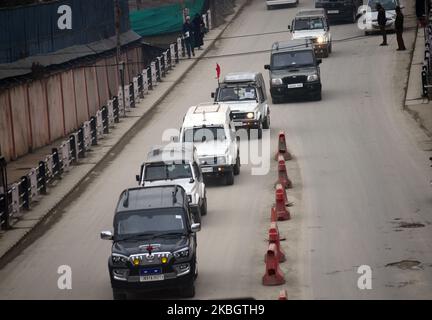 A convoy of European Union delegation crossing the road in Srinagar,Kashmir on February 12, 2020.A fresh batch of 25 foreign diplomats including from Germany ,Canada, France and Afghanistan are visiting Jammu and Kashmir to witness the situation.Uncertainty continues across Kashmir after India revoked Article 370 of its constitution which granted Kashmir autonomy. (Photo by Faisal Khan/NurPhoto) Stock Photo