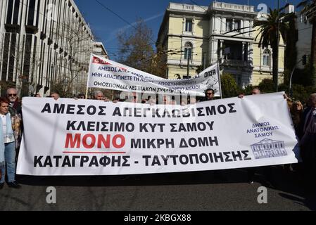 Greek island residents protest on February 13, 2020 in central Athens, Greece against a recent legislative act which allows the government to proceed with the requisition of properties and land in order to construct new closed migrant camps. (Photo by Nicolas Koutsokostas/NurPhoto) Stock Photo